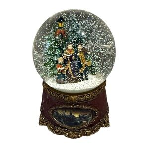 Roma Festive Family Singing Snow Globe with Green, Red & White Details.